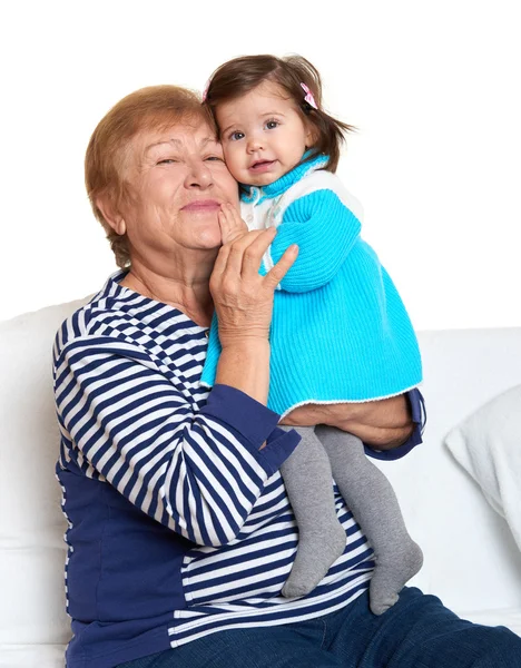 Portrait of baby girl and grandmother on white, happy family concept — Stock Photo, Image