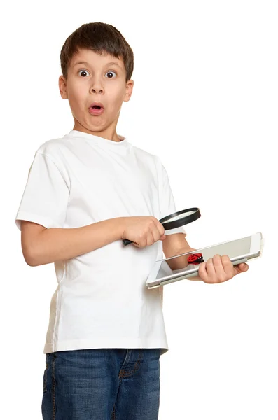 Boy with computer tablet found a bug, information security concept — Stock Photo, Image