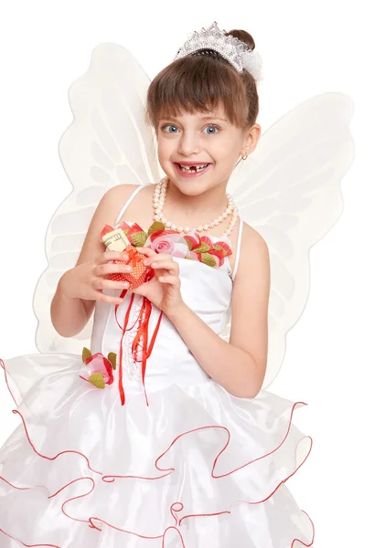 Lost tooth child dressed as tooth fairy with gifts and money — Stock Photo, Image