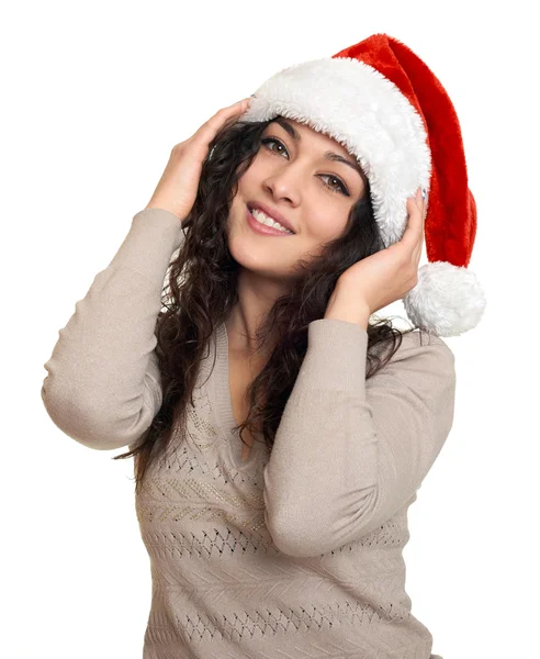 在圣诞老人的助手帽子上白色构成美丽的年轻女子肖像 — 图库照片