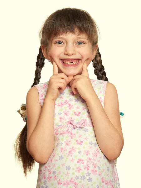 Lost tooth girl portrait, studio shoot on white background — Stock Photo, Image