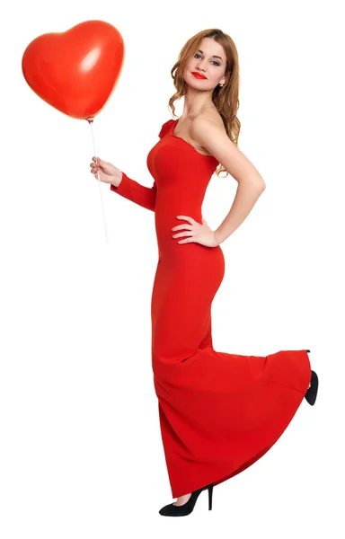 Red dressed woman with heart shape balloon on white — Stock Photo, Image