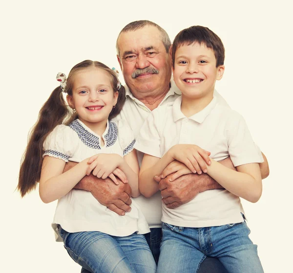 Grandfather and grandchildren portrait studio shoot — Stock Photo, Image