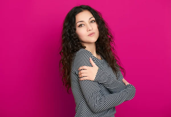 Beautiful girl glamour portrait on pink, long curly hair — Stock Photo, Image