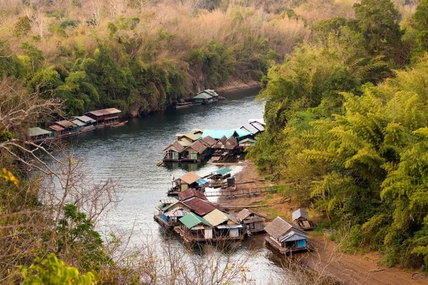 Floating rafts on tropical river — Stock Photo, Image