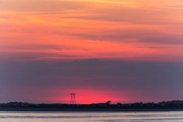 Červený západ slunce nad pláží Carnac — Stock fotografie