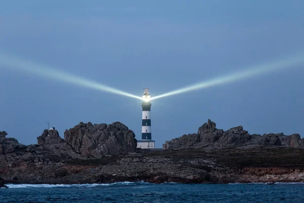 Powerful lighthouse illuminated — Stock Photo, Image