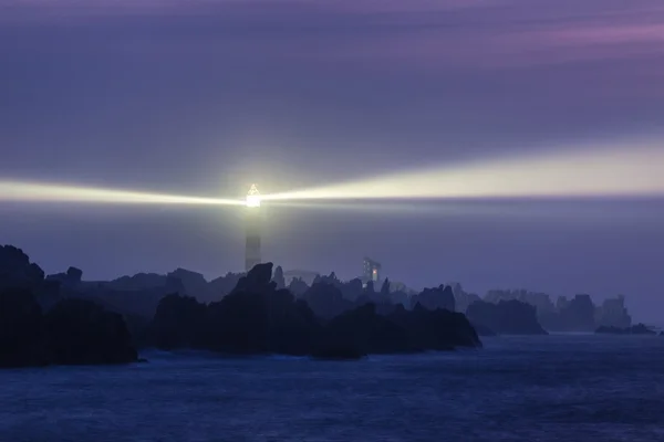 Powerful lighthouse at night — Stock Photo, Image