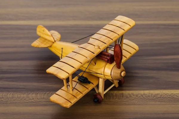 Wood model airplane on desk — Stock Photo, Image