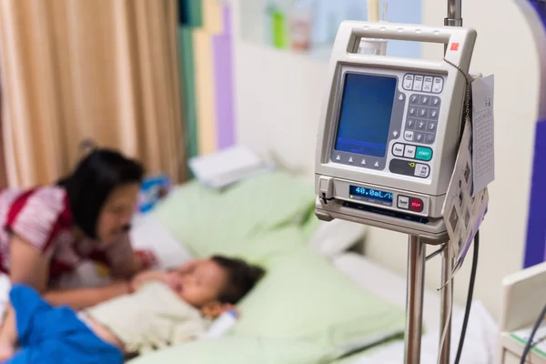 Hypertension monitor and IV needle machine — Stock Photo, Image