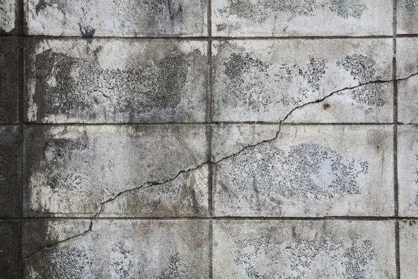 Alte rissige Steinmauer — Stockfoto