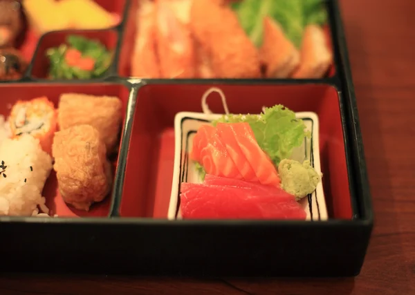 Bento box with tuna and salmon sashimi — Stock Photo, Image