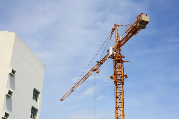 Yellow Crane at building construction site — Stock Photo, Image