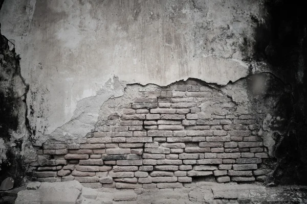 Ciment fissuré et vieux mur de briques — Photo