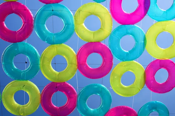 Many colorful transparent rubber rings — Stock Photo, Image