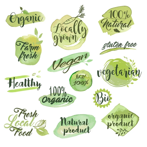 Etiquetas y distintivos de acuarela dibujados a mano para alimentos orgánicos, restaurantes y productos naturales — Vector de stock