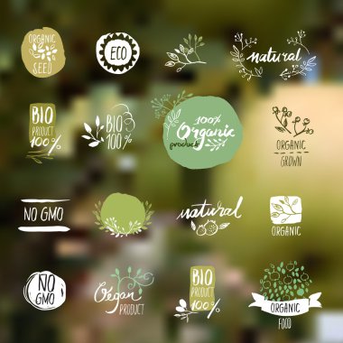 Set of hand drawn style badges and elements for organic food and drink clipart