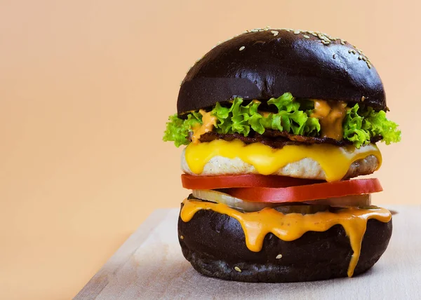 chicken burger in a black bun
