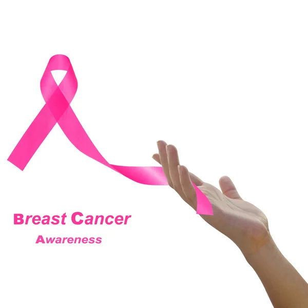 Womans hand holding pink breast cancer awareness ribbon against — Stock Photo, Image