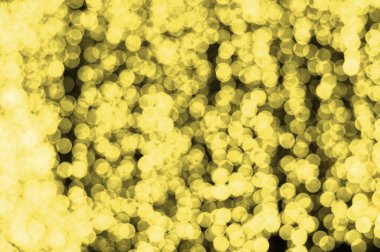 Sarı defocus bokeh ışıklarının soyut arkaplanı