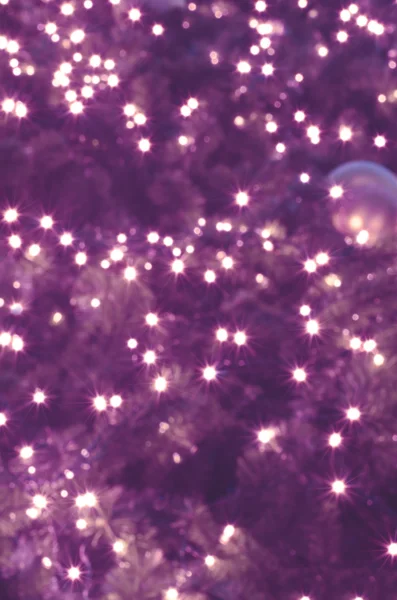 Abstract purple blur background from hristmas lights ornaments o — Stock Photo, Image