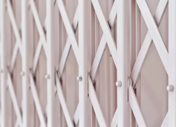 Pink metal grille sliding door — Stock Photo, Image