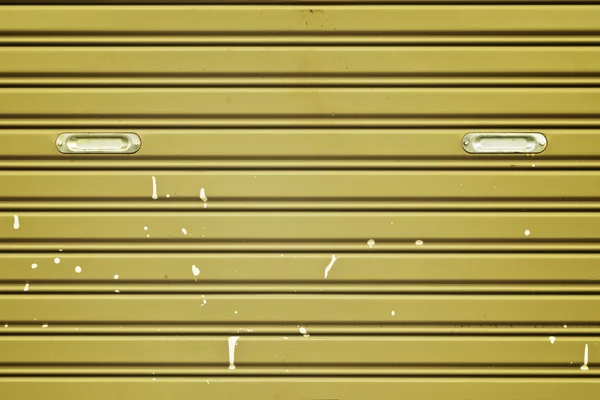 Dirty corrugated metal sheet slide door — Stock Photo, Image