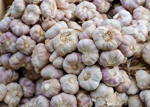 A piacon garlics — Stock Fotó