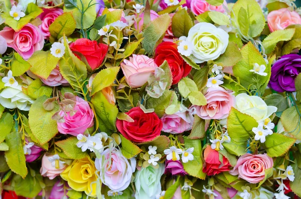 Colorful artificial flowers — Stock Photo, Image