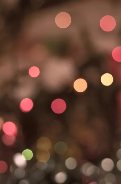 Размытый красочный боке рождественских огней — стоковое фото
