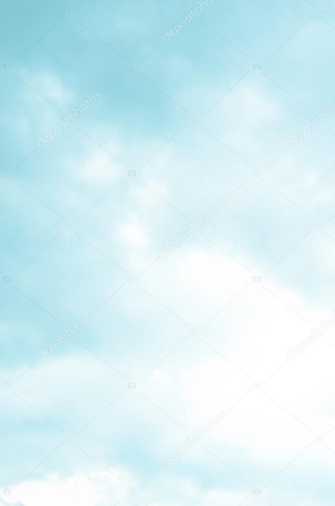 Abstract background from defocused blue and clouds sky