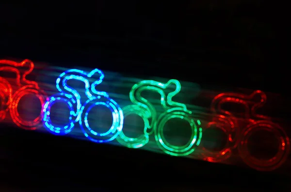 Colorido ciclista forma bokeh luces — Foto de Stock