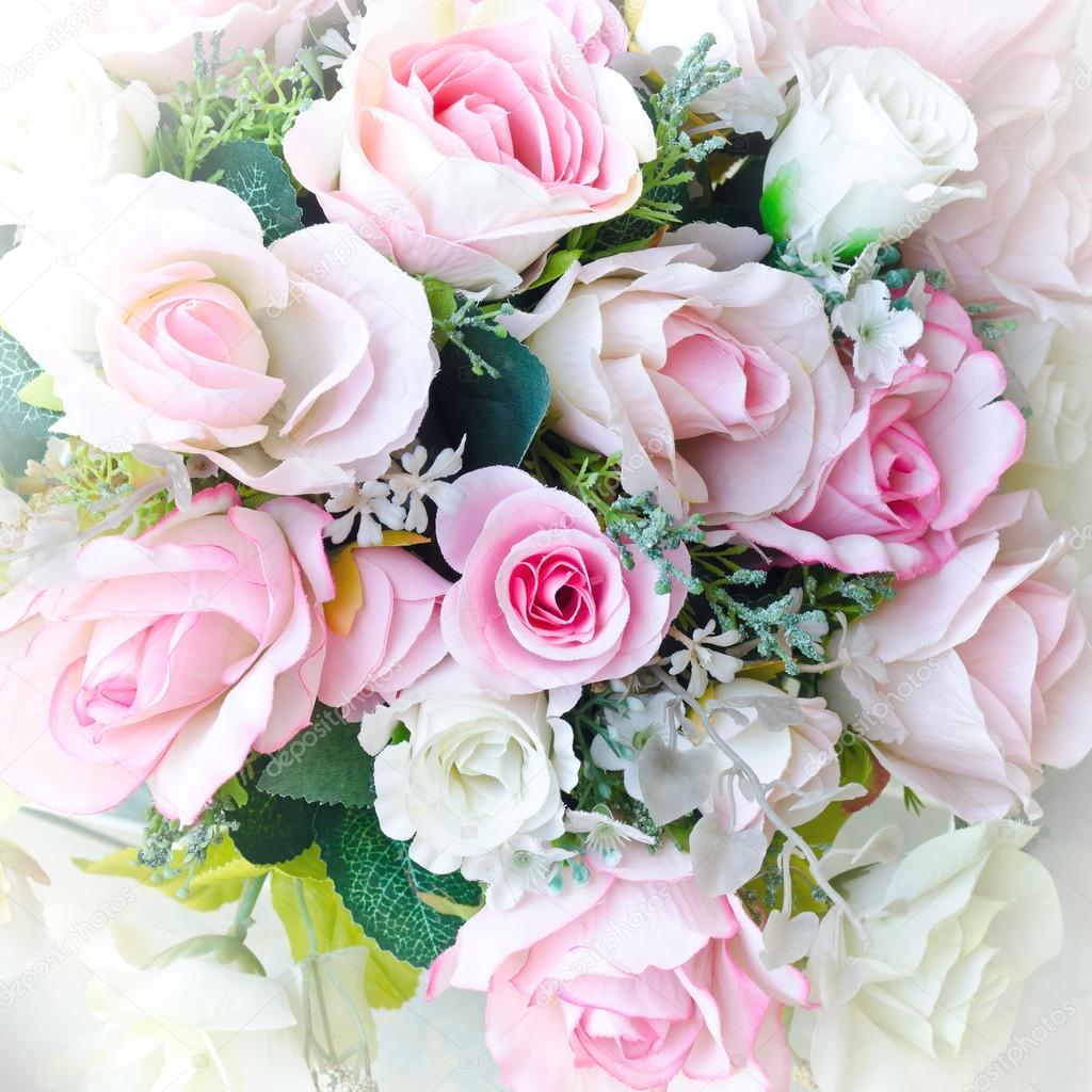 soft focus of artificial sweet pink and white roses bouquet