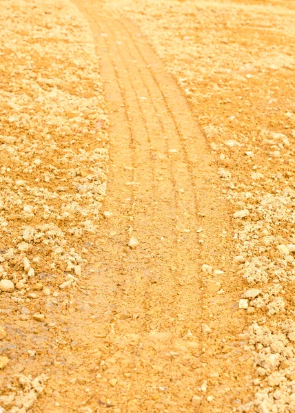 Wheel tracks on the soil — Stock Photo, Image