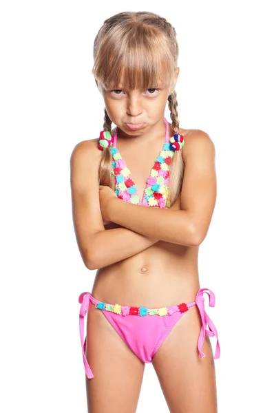 Unhappy little girl in swimsuit — Stock Photo, Image