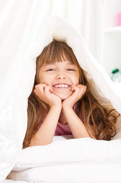 Girl awaked up in bed — Stock Photo, Image