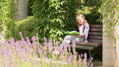 Mother and daughter reading books