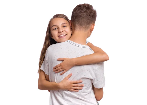 Adolescente menino e menina no branco — Fotografia de Stock