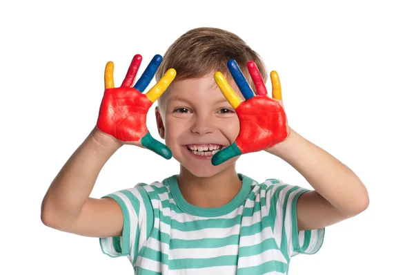 Niño pequeño con pinturas en las manos —  Fotos de Stock