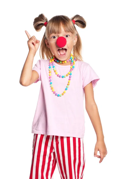Маленькая девочка с клоунским носом — стоковое фото