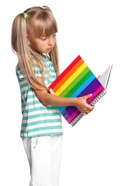 Niña con cuadernos de ejercicios — Foto de Stock