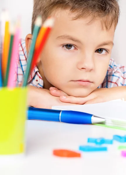 Boy doing homework Stock Photo