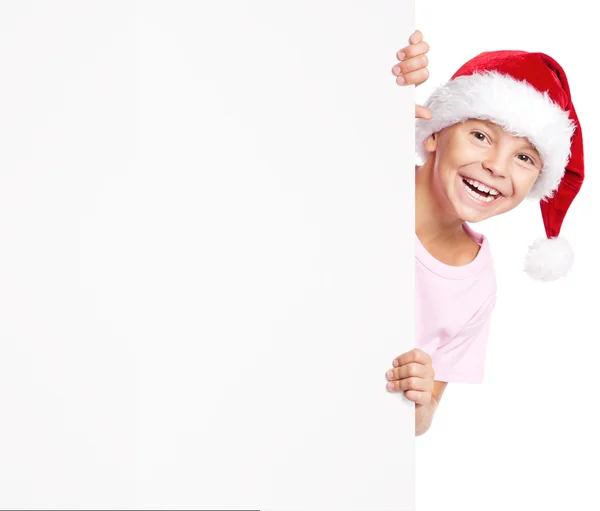 Boy v Santa klobouk s bílým prázdné — Stock fotografie