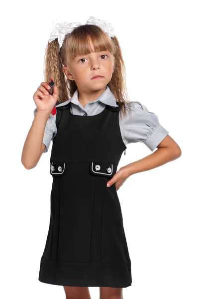 Emotional little girl in school uniform — Stock Photo, Image
