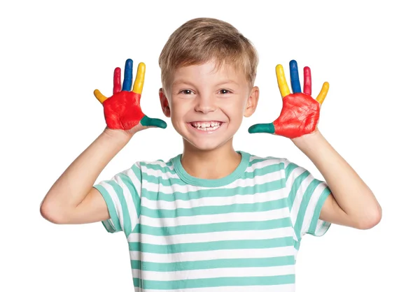 Glücklicher kleiner Junge mit Farben auf den Händen — Stockfoto