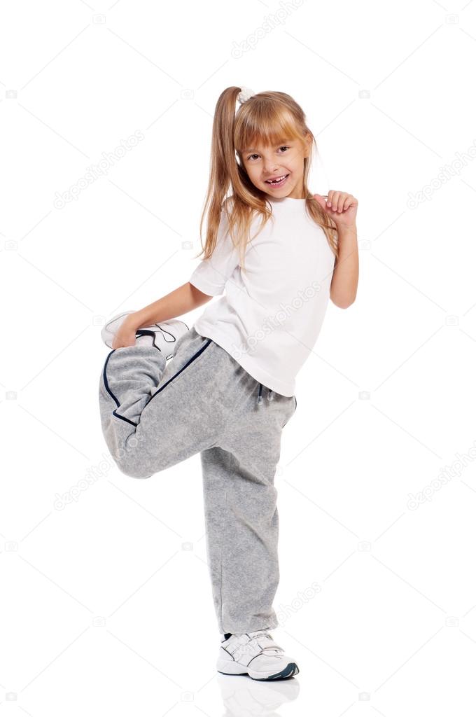Happy little girl dancing