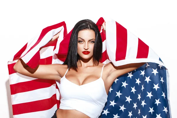 ABD bayrağı tutan seksi kadın — Stok fotoğraf