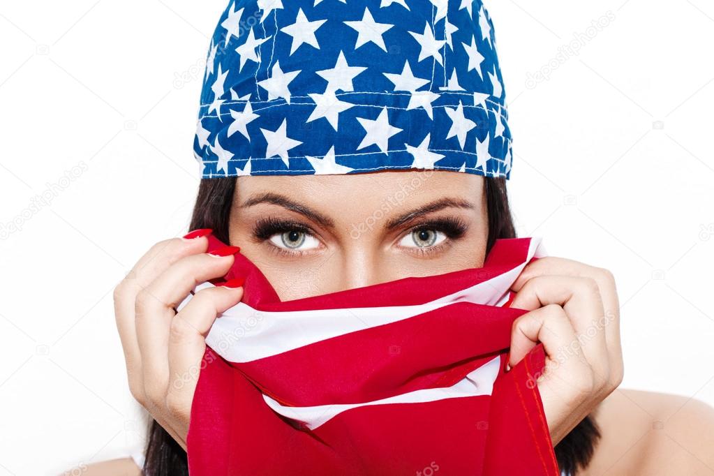 Sexy woman face covered with usa flag