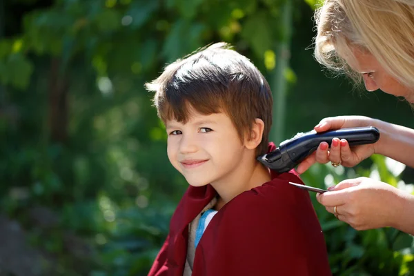Little boy haircut outdoor — Stock Photo, Image