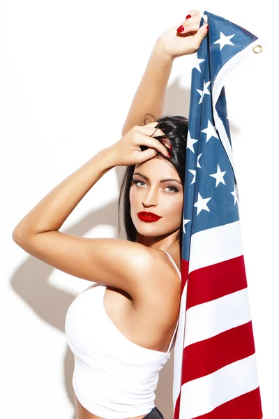 Seksowny brunetka dama trzyma flagę Usa — Zdjęcie stockowe